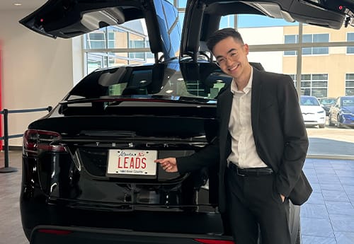 William Kabrall with the LEADS license plate