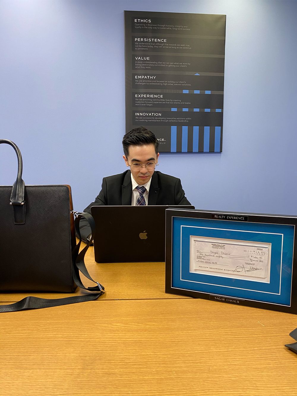 Sagar Dasaur working at the New Realty Group office
